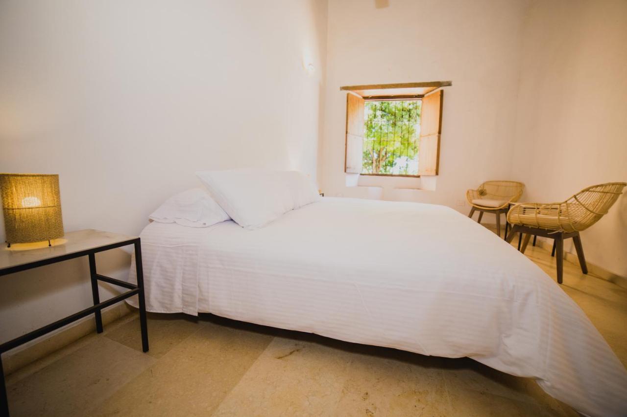 Karakali Boutique Hotel Mompos Exteriör bild